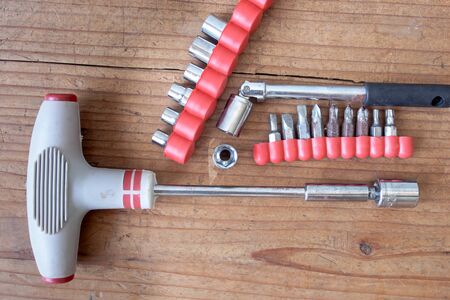 hand tool on wood background
