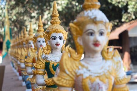 The plaster statue on the temple fence.の写真素材
