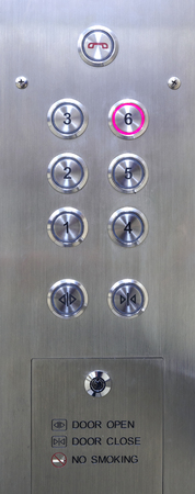 Closeup of a control panel with buttons in the elevatorの写真素材