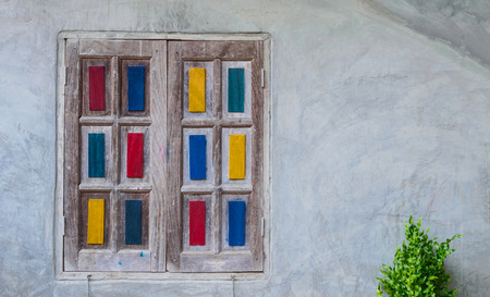 Vintage dirty window on vintage wallの写真素材