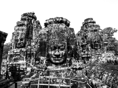 Black and white Ancient stone faces of Bayon temple, Angkor, Cambodiaの写真素材