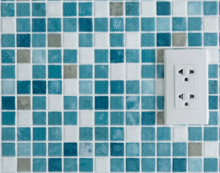 power socket on the Blue glass wall mosaic for texture background