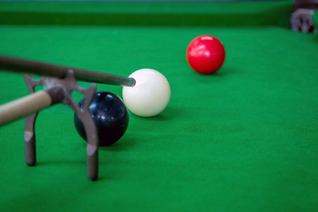 Spider rest,Use of a cue rest which is placed high above the snooker ball when the cue ball is...