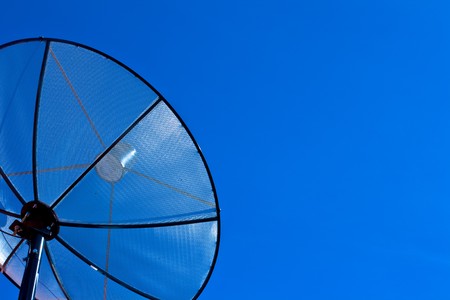Satellite disc in blue skyの写真素材