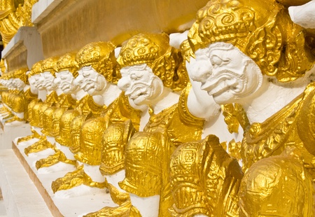 Thai giants sculpture sitting and carrying on the backの写真素材