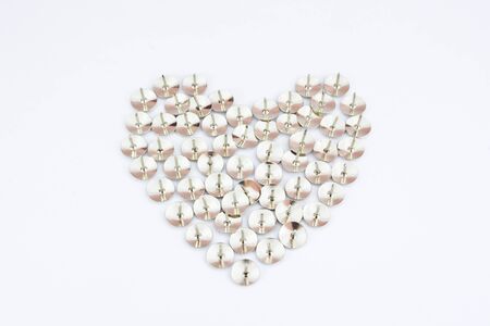 Heart made of thumbtack. fake の写真素材