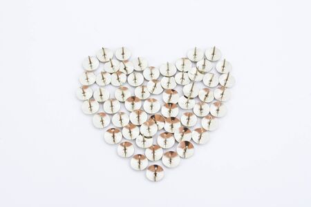 Heart made of thumbtack. fake の写真素材