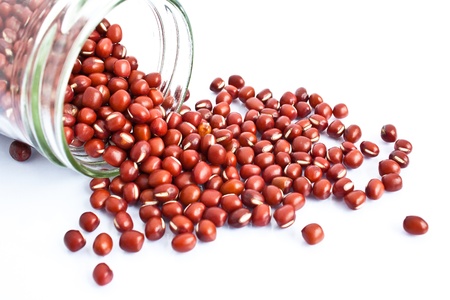 azuki beans in a bottle isolate on white backgroundの写真素材