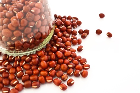 azuki beans in a bottle isolate on white backgroundの写真素材