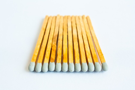 Gray head matches on white backgroundの写真素材