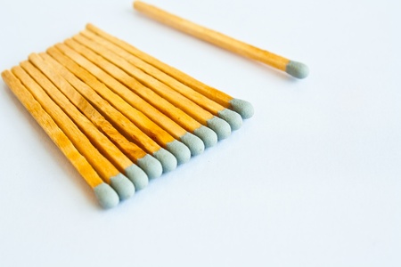 Gray head matches on white backgroundの写真素材