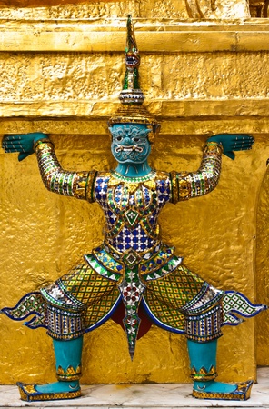 Giant guardians on base of pagoda,Wat Phra Kaew, Thailandの写真素材