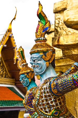 Giant guardians on base of pagoda,Wat Phra Kaew, Thailandの写真素材