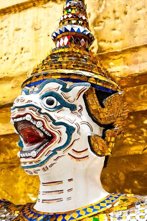 Statue the face giant at Wat Phra Kaew in Bangkok, Thailandの写真素材
