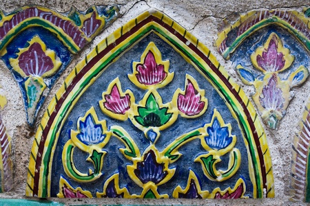 Colorful Thai style ceramic decoration at Wat Phra Kaew, Bangkok, Thailandの写真素材