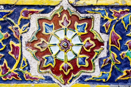 Colorful Thai style ceramic decoration at Wat Phra Kaew, Bangkok, Thailandの写真素材