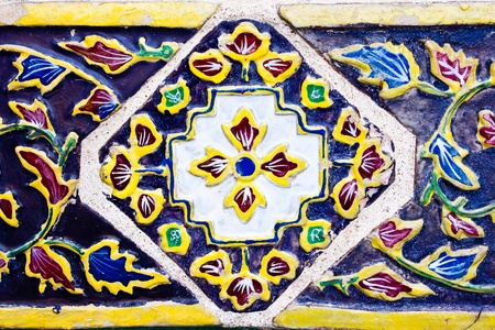 Colorful Thai style ceramic decoration at Wat Phra Kaew, Bangkok, Thailandの写真素材