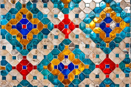 Colorful Thai style ceramic decoration at Wat Phra Kaew, Bangkok, Thailandの写真素材
