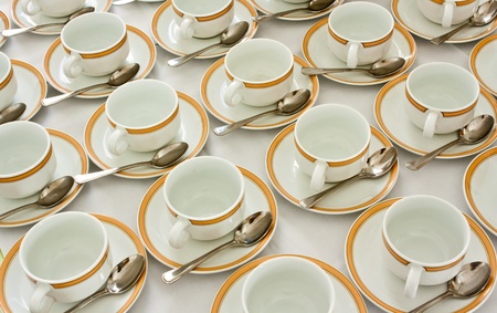 Many rows of coffee cup and saucer with teaspoonの写真素材