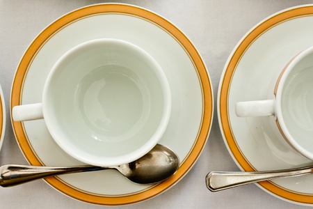 Empty cup and saucer with teaspoon,top viewの写真素材