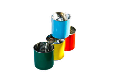 Colorful empty cans   red blue yellow and green  isolate on whiteの写真素材