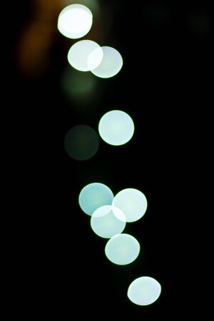 Bokeh Lights in the city coloured spots of lightの写真素材