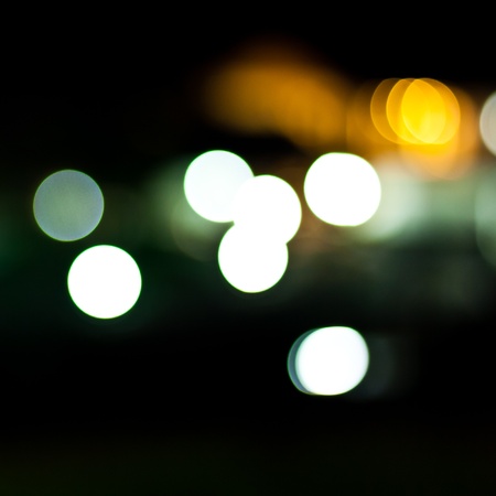 Bokeh Lights in the city coloured spots of lightの写真素材