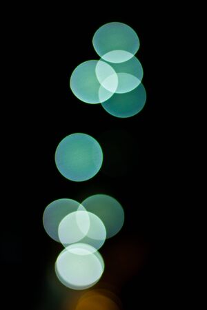 Bokeh Lights in the city coloured spots of lightの写真素材