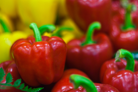 Ripe Yellow, Red  Peppers in Vegetables Marketの写真素材
