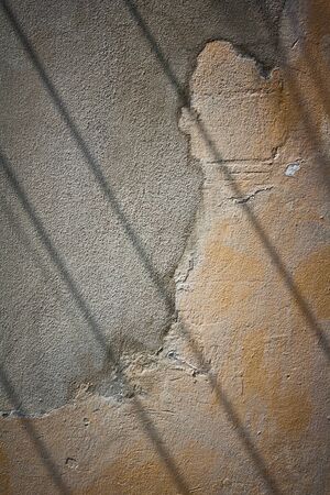 different texture of old concrete wall with line shadowの写真素材