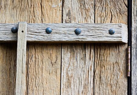 Part of grunge wooden door with cracked