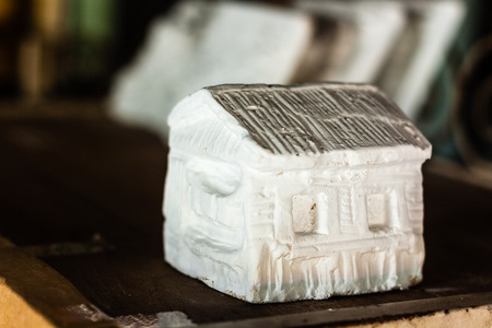 handy craft house statue model made from plasterの写真素材