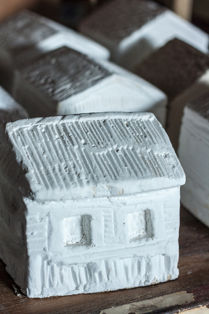 handy craft house statue model made from plasterの写真素材