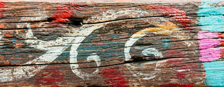 Multicolored background: old wooden multicolored surface and cracking textureの写真素材