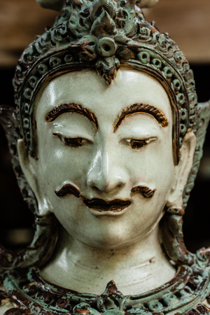 Face of Thai male angel traditional style ceramc sculptureの写真素材