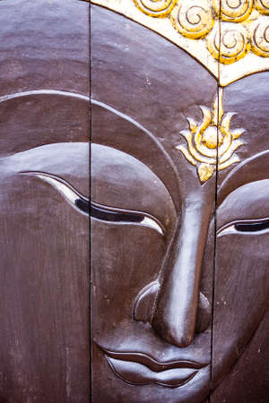 Buddha image in Thai style wood gravingの写真素材