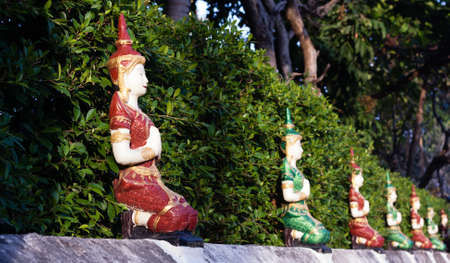 The gods statue on the wall Thai temple wall decoration in the northの写真素材