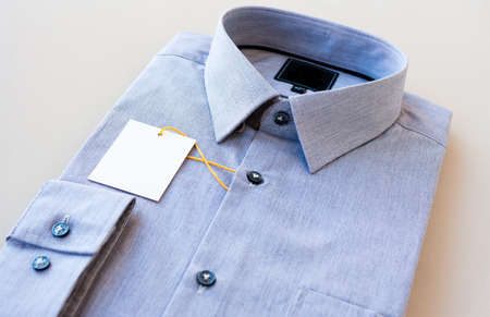 Close up of business suit or formal shirt or t shirt isolated on whiteの写真素材