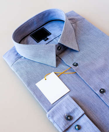 Close up of business suit or formal shirt or t shirt isolated on whiteの写真素材