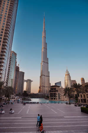 Dec 14th 2020, Dubai, UAE. View of the Burj Park with tourists and residents at evening time with Burj Khalifa in the background captured at Dubai, UAE.のeditorial素材