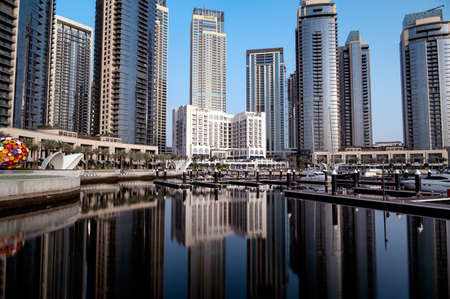 12th march 2021,Dubai,UAE. Dubai creek harbor skyline with embankment promenade ,hotels, shops and residences captured in the evening time at the Dubai creek harbor, Ras al khor, Dubai , UAE.のeditorial素材