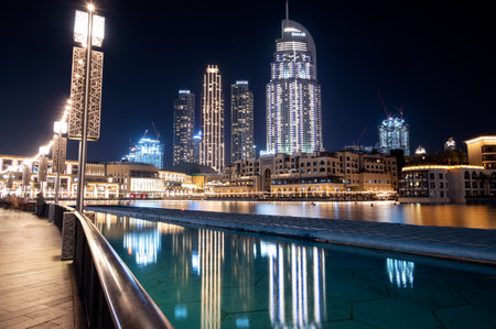 Dec 17 2020, Al seef village, Dubai. Panoramic view of the illuminated sky scrappers,hotels and buildings showing beautiful reflections in water captured at the Al Seef, Dubai ,UAE.のeditorial素材