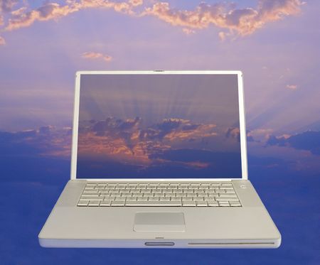 front view of laptop computer with clear screen to sunrise background
