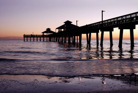 Florida Fishing Pier silhouette at duskの写真素材