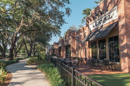 WINTER GARDEN, FLORIDA: MAY 29, 2019 - Plant Street Market a brick building featuring local organic food vendors, craft beer, and outside seating.のeditorial素材