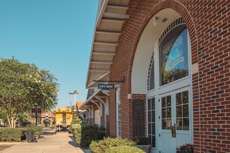 WINTER GARDEN, FLORIDA: MAY 29, 2019 - Entrance to the Heritage Museum. A yellow railroad car sits...