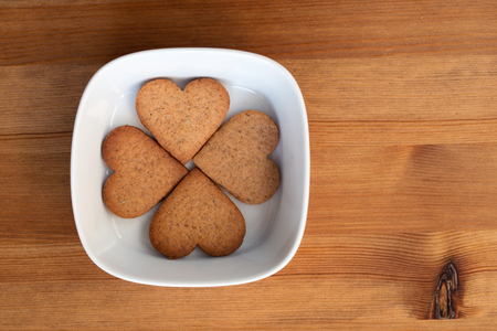 The white bowl with homemade cookiesの写真素材