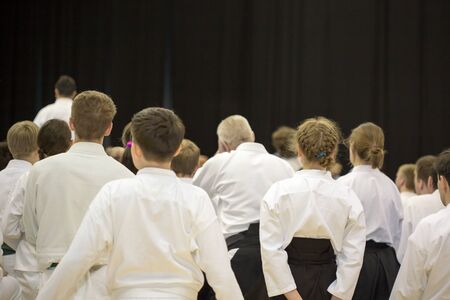 People in kimono and hakama are on tatami on martial arts training seminarの写真素材