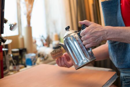 An artist priming canvas. Selective focusの写真素材