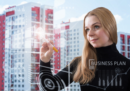 Businesswoman using innovative technologiesの写真素材